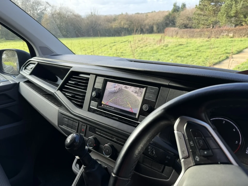 Volkswagen dashboard showing the reversing camera view on the factory screen